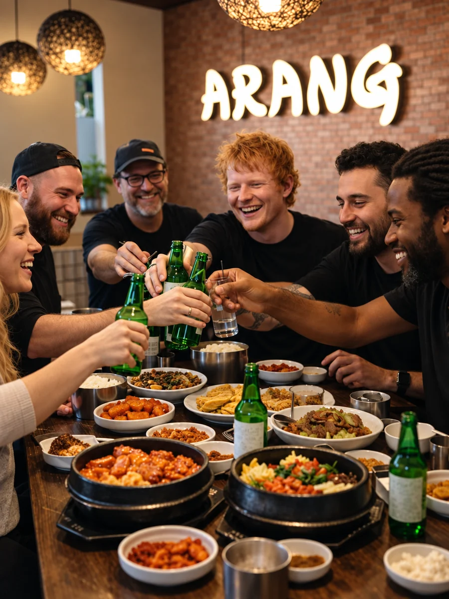 Friends sharing Korean dishes around the Arang table